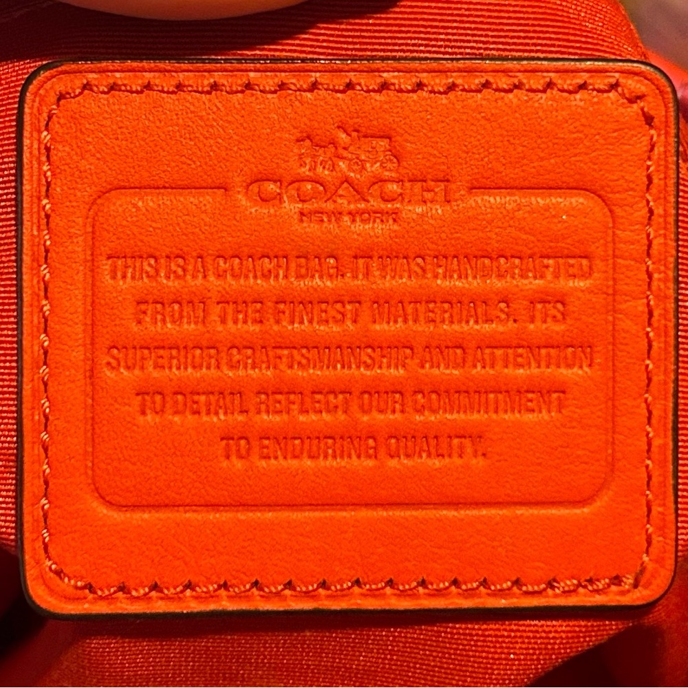Tan and Red medium sized Coach bag